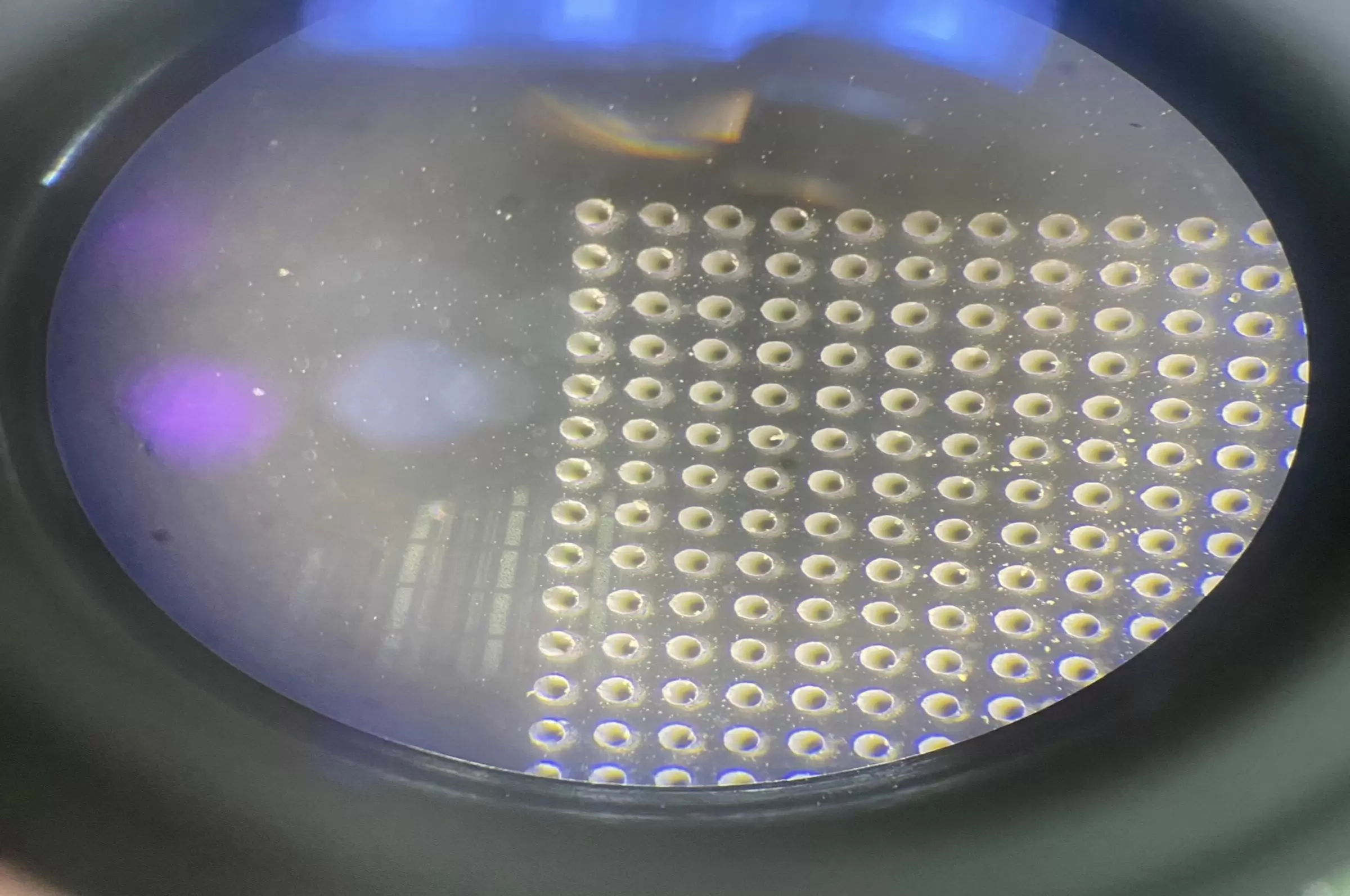 Through-glass Vias by Laser Modification